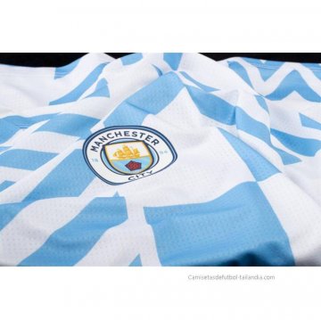 Camiseta Pre Partido del Manchester City 2022 Azul y Blanco